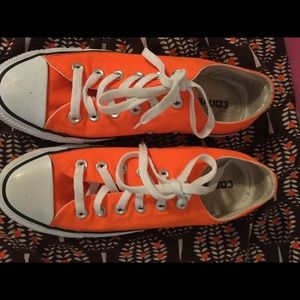 Bright neon orange converse